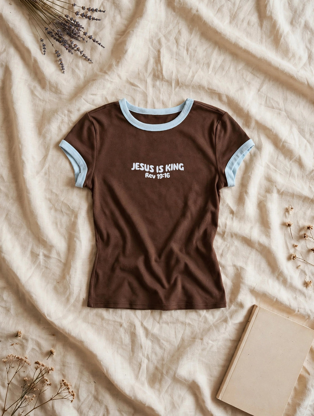 Jesus Is King ringer tee flat lay