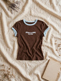 Jesus Is King ringer tee flat lay